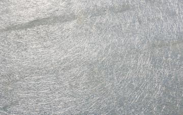 Poulshot laminate fibreglass or shingles?